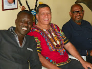 Sam Okello, Brian Williams and Forest Whitaker.