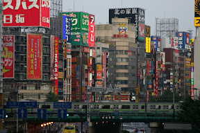 Shinjuku district and JR metro train