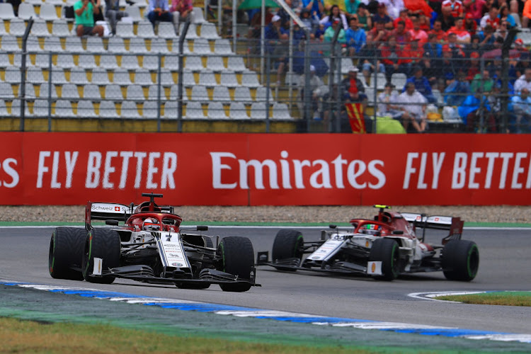 Kimi Raikkonen and Antonio Giovinazzi of Alfa Romeo Racing in action at the Hockenheimring on 28 July 2019.