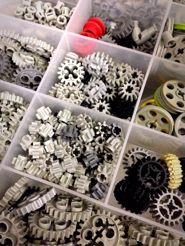 A box of Lego gears; soon to be part of a ingenious mechanical project.