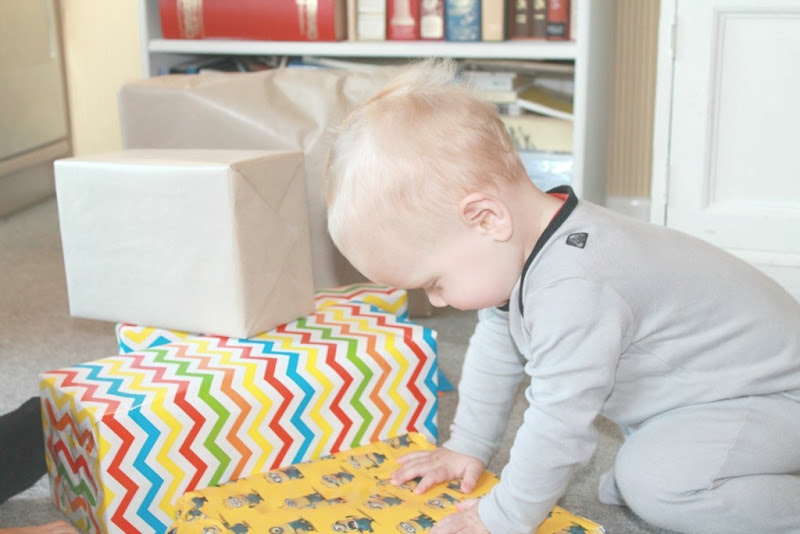 baby-climbing-on-presents