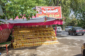 A loquat vendor with his stall near Haripur, Khyber Pakhtunkhwa