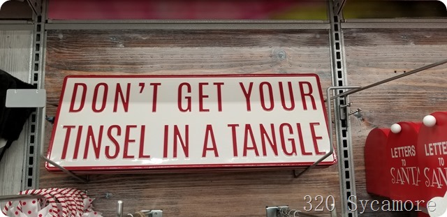 tinsel in a tangle sign