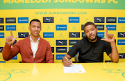 Mamelodi Sundowns chair Thlopie Motsepe looks on as new signing Sipho Mbule pens deal to join the Brazilians.