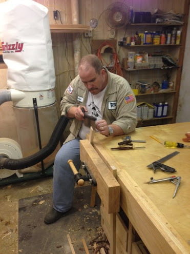 Kenny Comeaux working in his shop