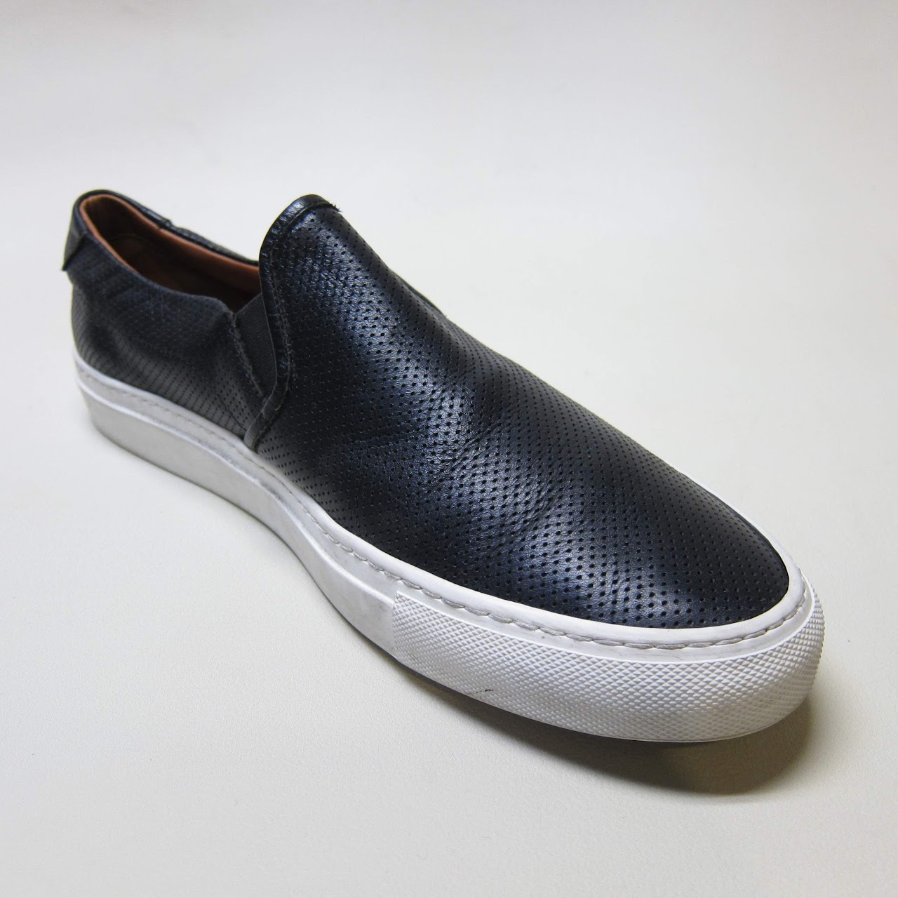 Common Projects Perforated Slip Ons