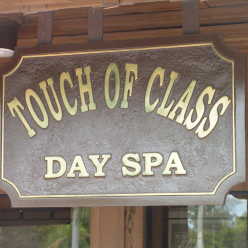 Touch of Class Day Spa logo