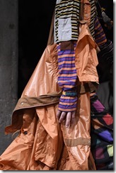 MILAN, ITALY - JANUARY 13:  A model, detail, walks the runway at the Marni show during Milan Men's Fashion Week Fall/Winter 2018/19 on January 13, 2018 in Milan, Italy.  (Photo by Pietro D'Aprano/Getty Images for Marni)