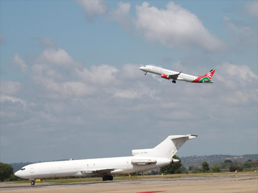 Kenya Airways plane takes off at Moi International Airport in Mombasa /NORBERT ALLAN