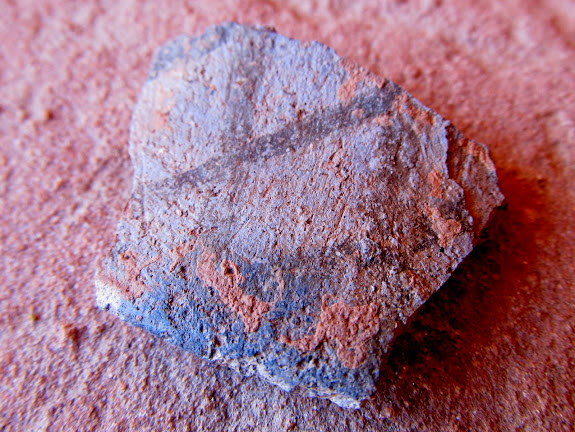 Piece of pottery in the Dragonfly Panel alcove