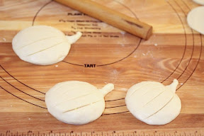 photo of three pumpkin pop tarts ready to be baked