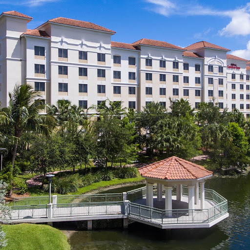 Hilton Garden Inn Palm Beach Gardens logo