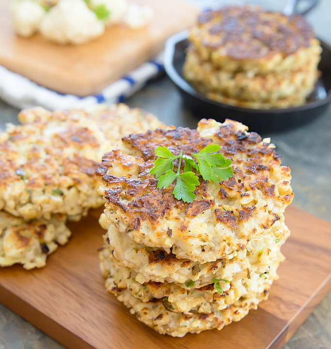 overhead photo of a stack of cauliflower fritters