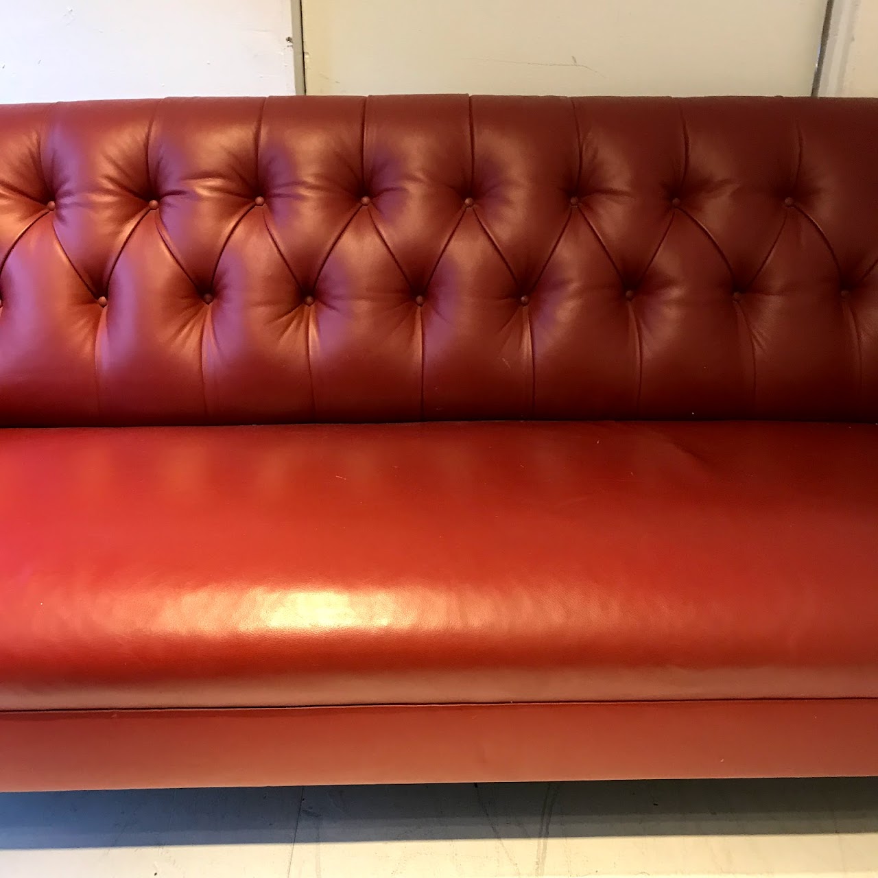 Tufted, Roll-Arm Leather Loveseat