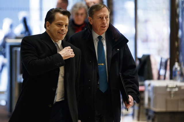 Anthony Scaramucci, left, walks with retired Gen. David Petraeus as he arrives at Trump Tower in New York for a meeting with President-elect Donald Trump, 12 December 2016. Photo: Evan Vucci / AP Photo