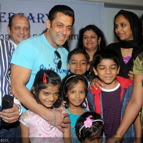 Salman Khan poses with kids during a charity event, held at Holy Family Hospital, in Mumbai, on October 11, 2013. (Pic: Viral Bhayani)