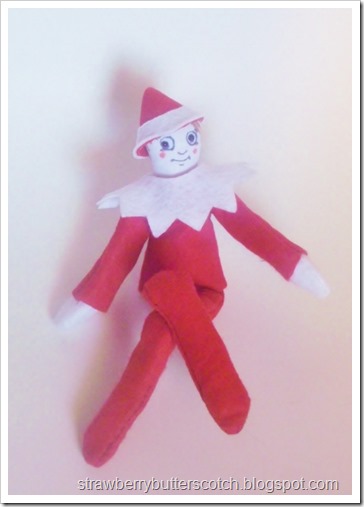 An diy elf on the shelf, now fully dressed.