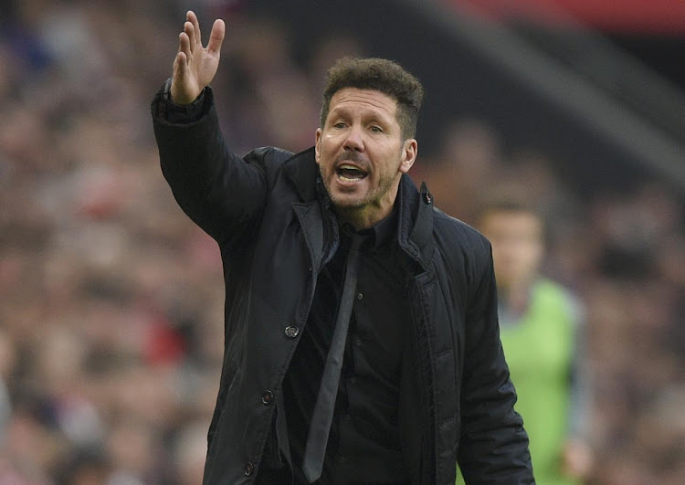 Atletico Madrid manager Diego Simeone shouts instructions to his players during a past match