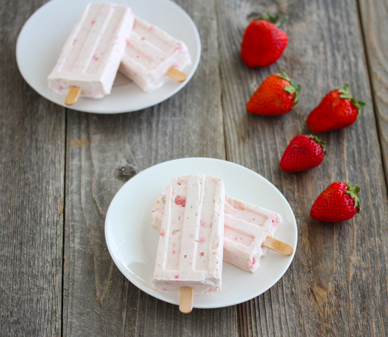 photo of two plates of Strawberry Cheesecake Ice Pops