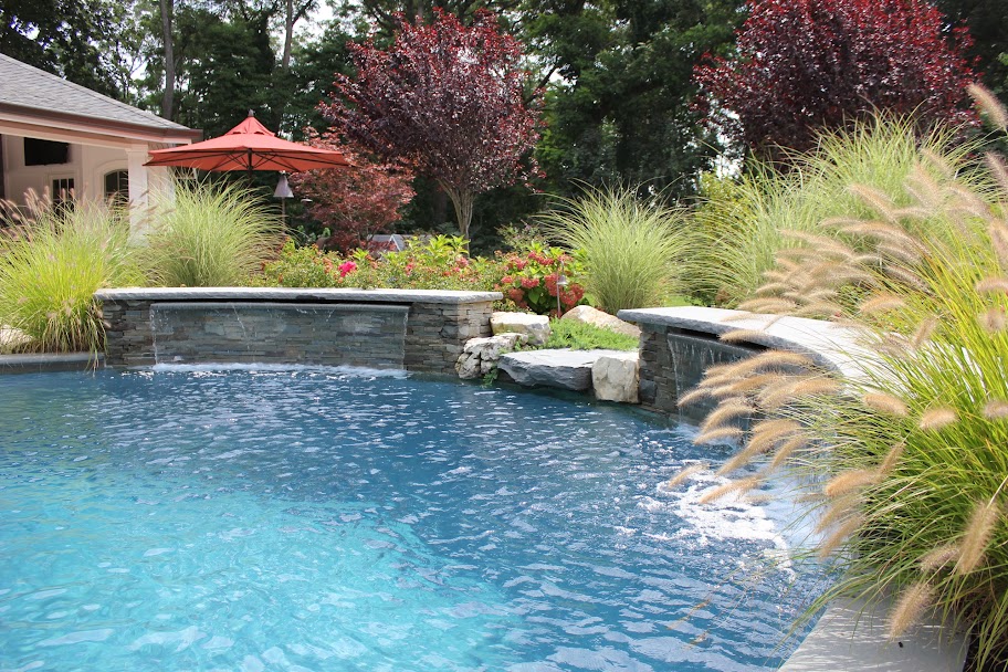 Pools And Spas Westbury  Free Form Custom Gunite Pool with Sheer Descent Waterfalls and Spill Over Gunite Spa - Old Westbury, Long Island NY