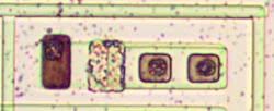 A multiple-emitter transistor from the Intel 3101 chip.