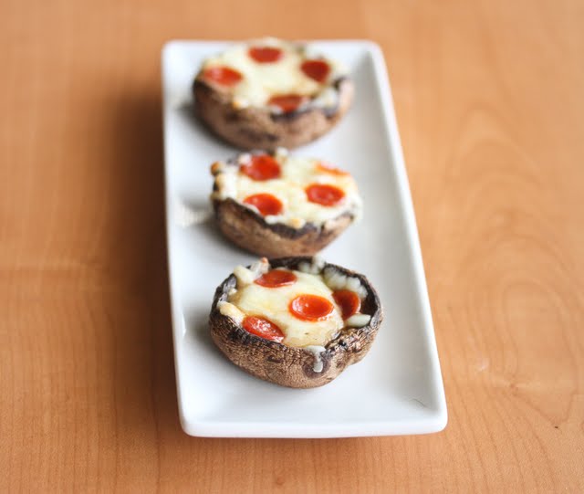 photo of three stuffed mushrooms on a plate