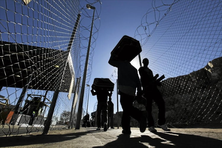 Foreigners enter South Africa at the Beitbridge border post.