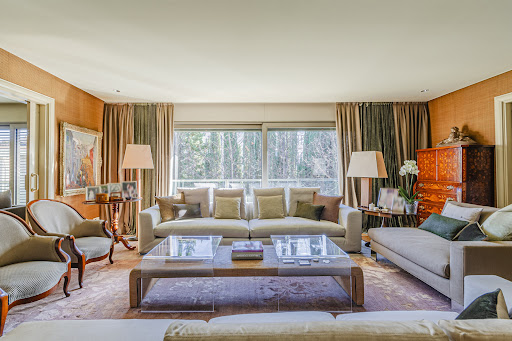 Buy this luxury apartment / penthouse in Barcelona (Spain) - Modern living room with sofas and coffee table