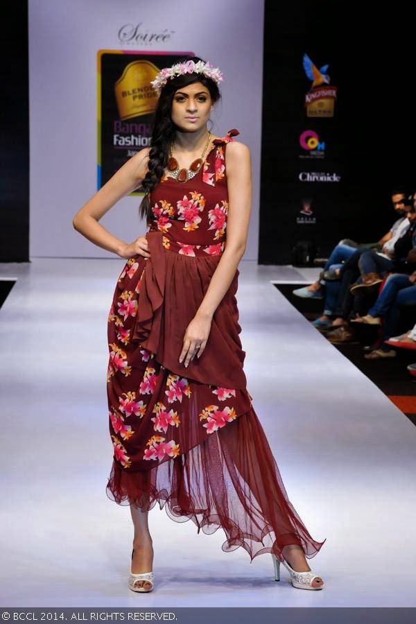 A model walks the ramp in a creation by designers Disha and Menaka during Blenders Pride Bangalore Fashion Week.<br /> 