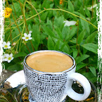 Espresso in the garden. 20120712-01-coffee-flowers.jpg