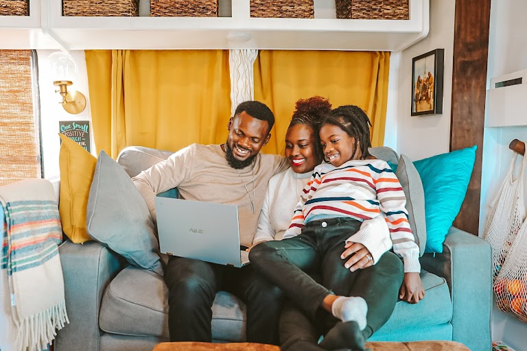 <p><em>Kay, her husband, and her son working together.</em></p>