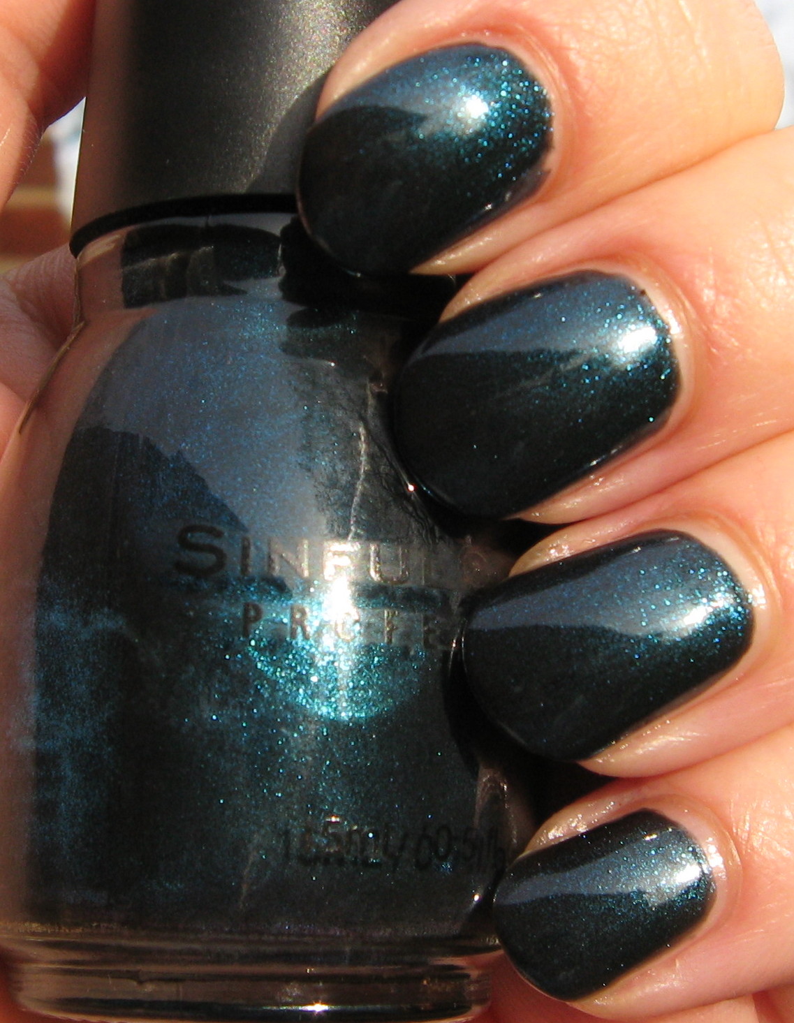 the darker teal base.