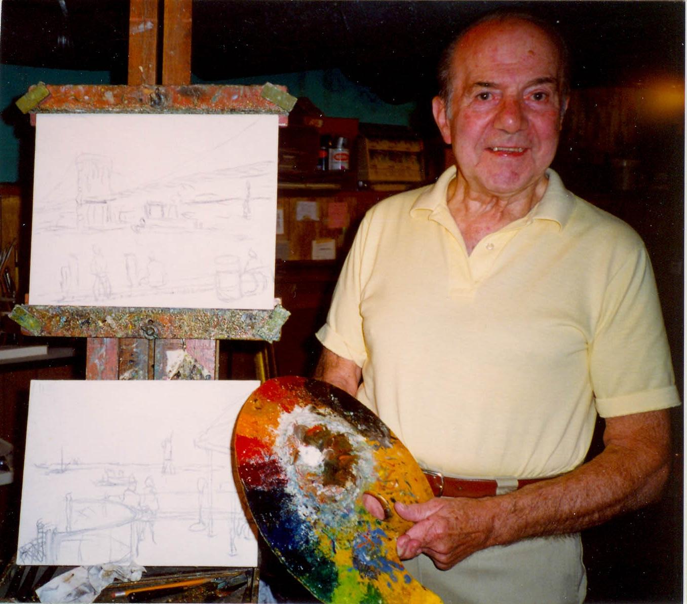 Dellasanta at his easel in