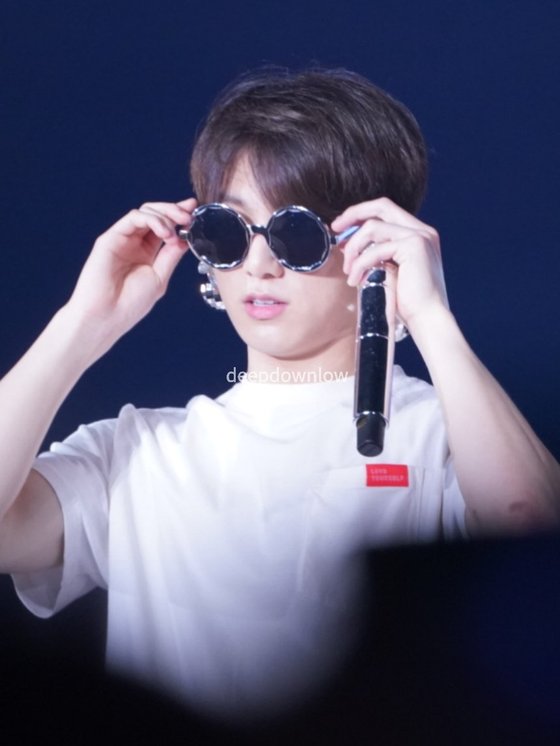 BTS's Jin Keeps Wearing Funny Glasses On Their Love Yourself Tour