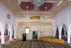 The place where everyone sits together & listen  Kirtan.