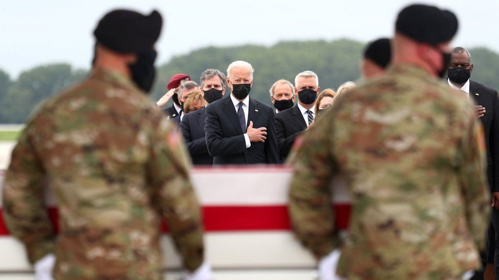 Joe Biden, US military, and family members pay last respect as bodies of 13 troops killed in Afghanistan airport attack return to the U.S. (photos)
