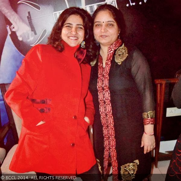 Vinti (L) and Asha at a ladies party, held in Kanpur.