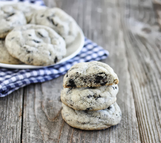 photo of a stack of three Thick and Soft Cookies and Cream Cookies with more cookies in the background