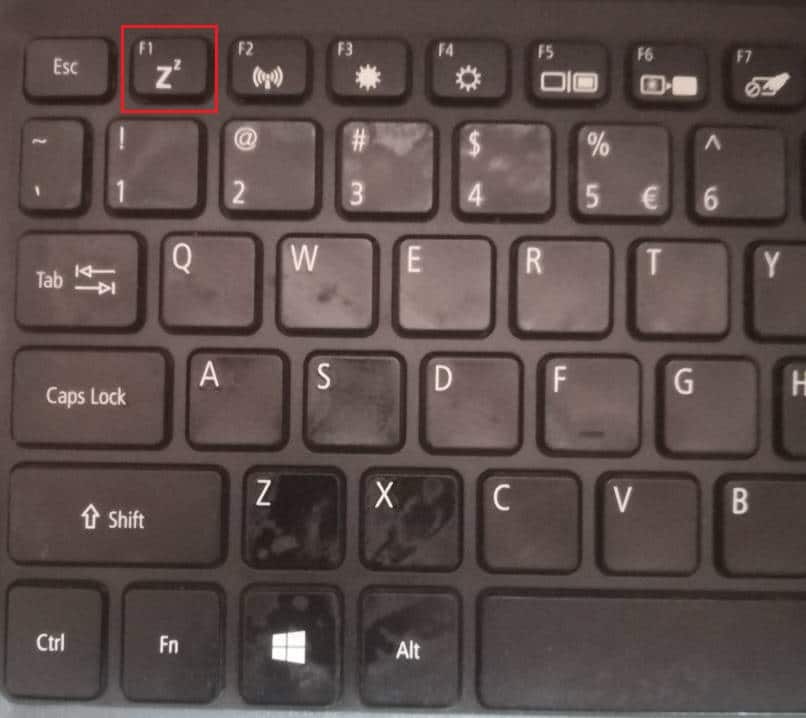 tecla de suspensión en el teclado