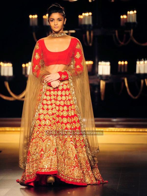 Bollywood actress Alia Bhatt walks the ramp for designer Manish Malhotra on Day 4 of India Couture Week, 2014, held at Taj Palace hotel, New Delhi. 