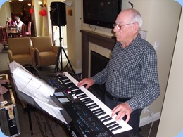 Laurie Conder playing his Roland BK-9 keyboard.