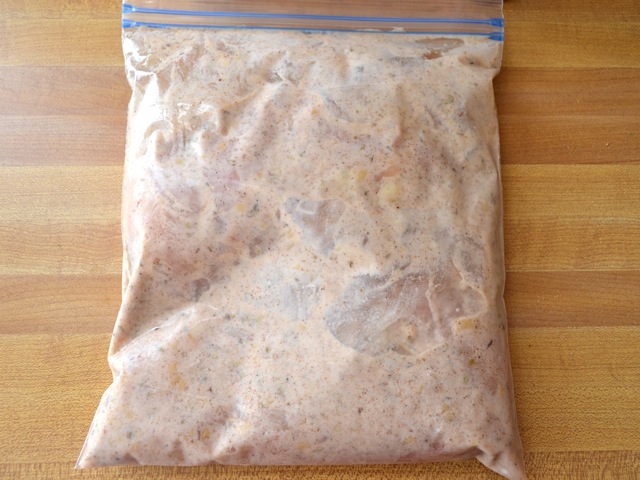 chicken marinating in yogurt shawarma marinate, in zip top bag