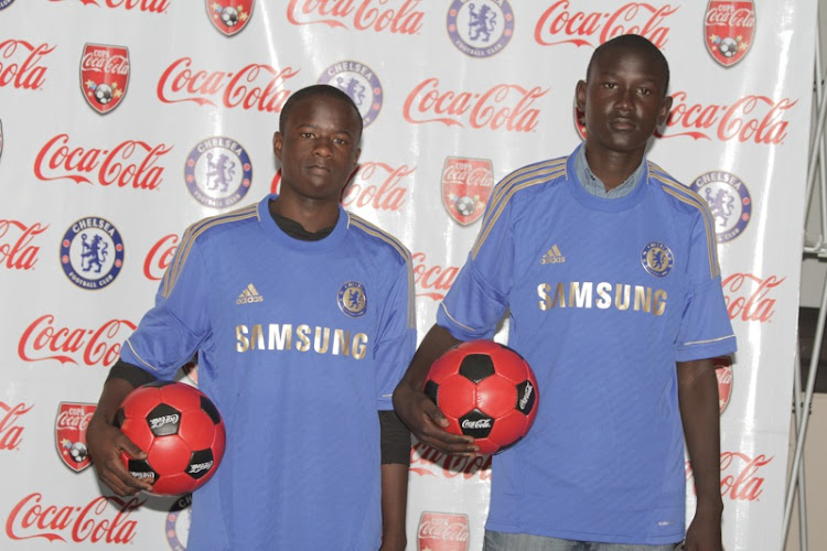 Christopher Oruchum (R) and Steven Ogweno when they were named in the COPA Coca Cola dream team to South Africa