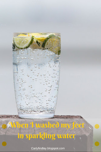 Image: glass of sparkling water with lemon and lime. Text: 'When I washed my feet in sparkling water.