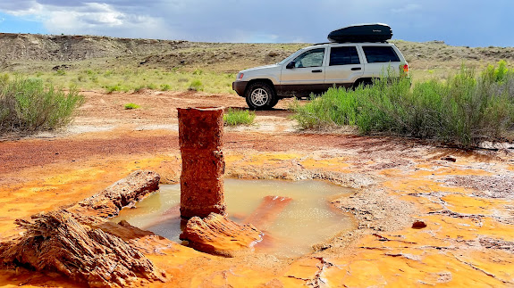 Jeep parked at the well