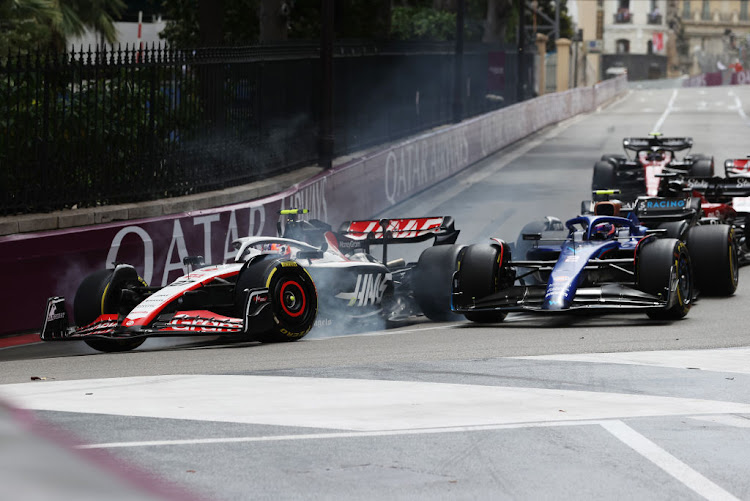 Nico Hulkenberg, left, was handed a five-second penalty for causing an opening lap collision with Williams rookie Logan Sargeant, right, last Sunday but Steiner was adamant there had been no contact.