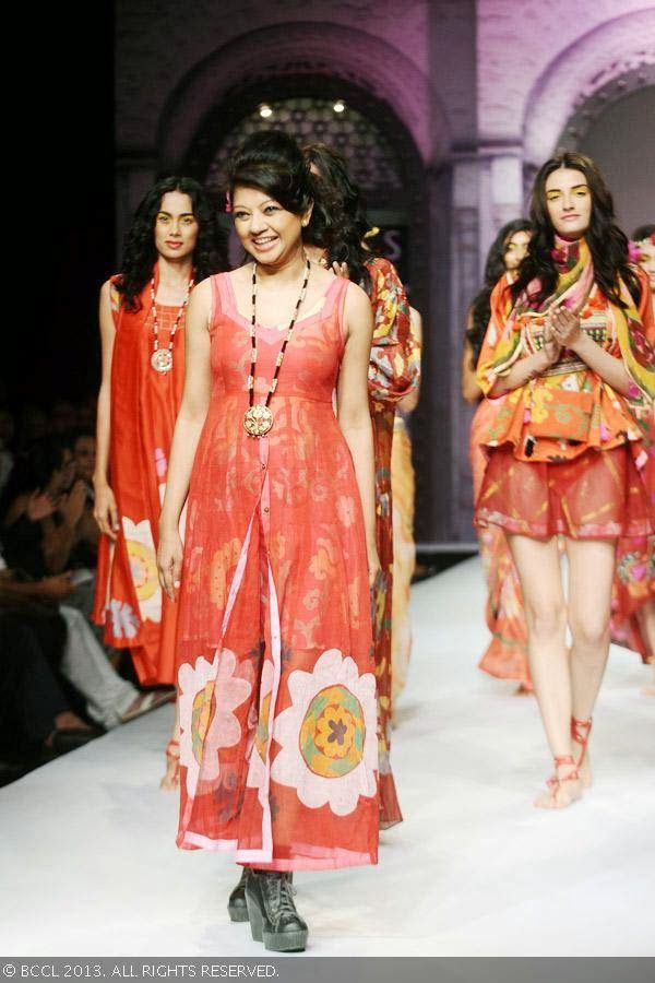 Designer Anupama Dayal walks the ramp after showcasing her creations on Day 1 of the Wills Lifestyle India Fashion Week (WIFW) Spring/Summer 2014, held in Delhi.