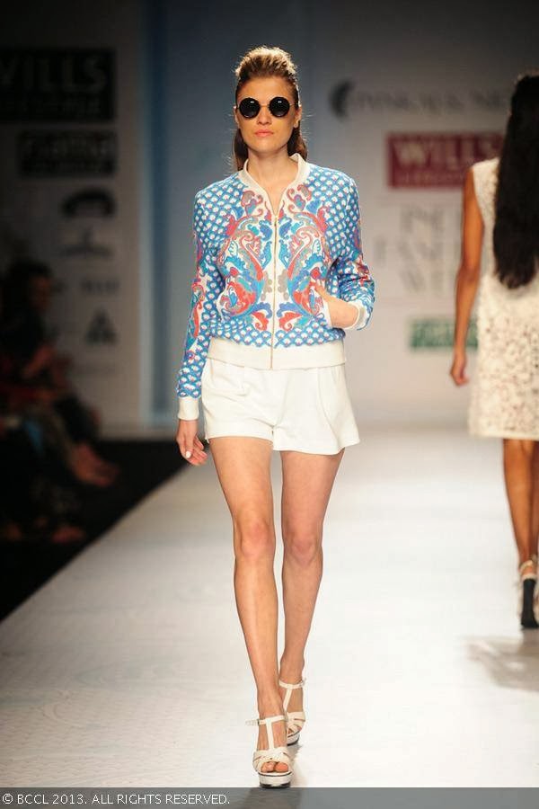 Polina walks the ramp for designer duo Pankaj and Nidhi on Day 2 of the Wills Lifestyle India Fashion Week (WIFW) Spring/Summer 2014, held in Delhi.