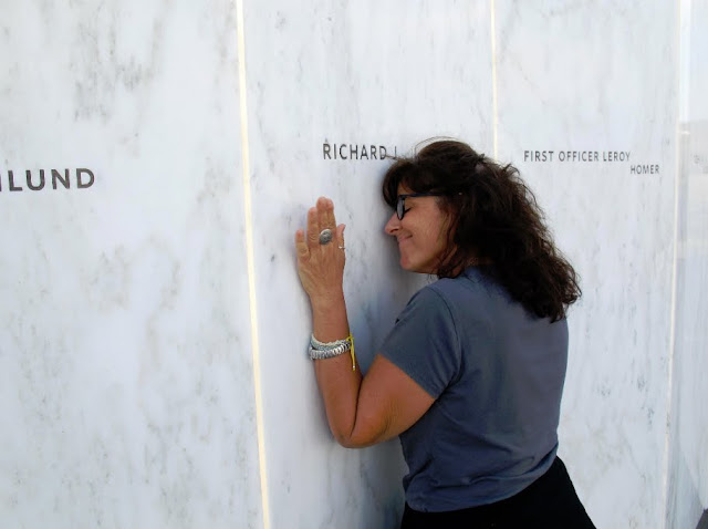 Lori Gaudagno at the spot of the Flight 93 National Memorial Wall with the name of her brother, Richard. Flight 93 National Memorial. Lassoing the Sun: A Year in America's National Parks