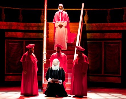 IN PERFORMANCE: (left to right) Jacob Kato, Wesley McCleary-Small, and Matthew Reese as the Cardinals, Deon'te Goodman as Pope Urban VIII (rear), and Derek Jackenheimer as Old Galileo (front) in Philip Glass's GALILEO GALILEI at UNCG Opera Theatre, April 2015 [Photo by Amy Holroyd, © by UNCG Opera Theatre]